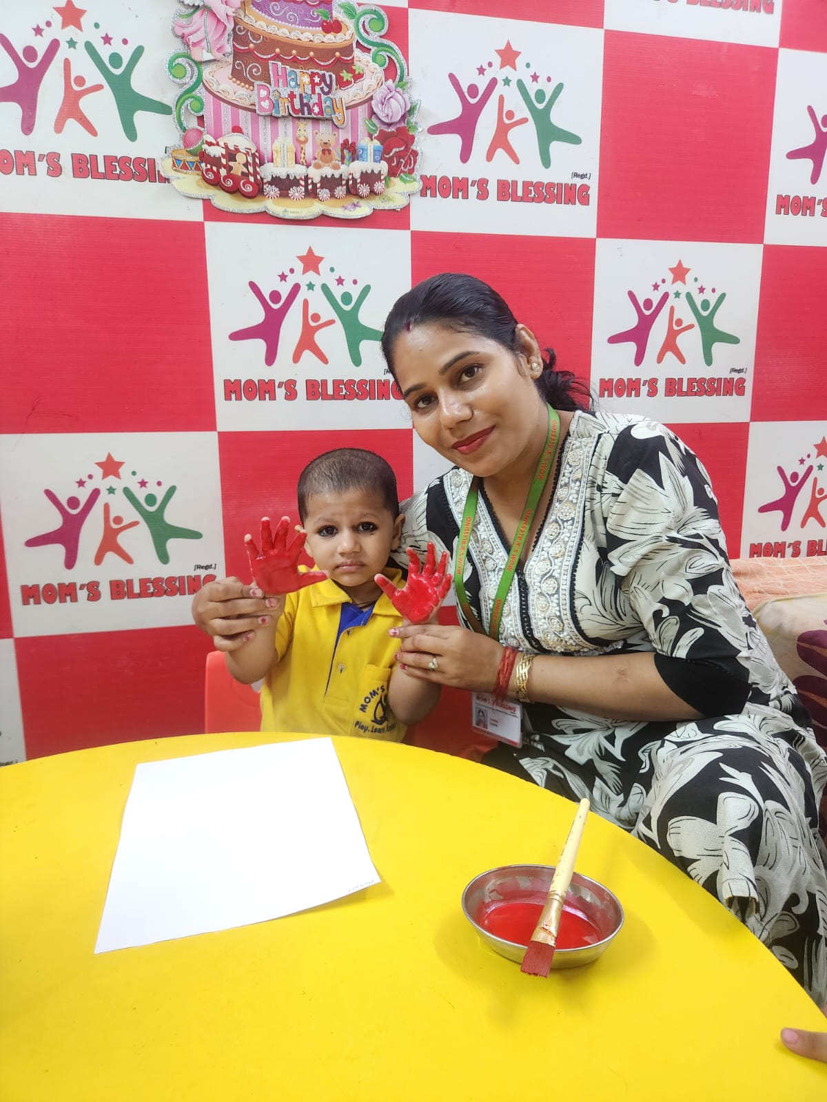 Loving teacher with young student